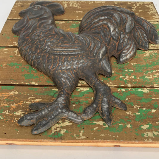 Metal Rooster on Wood Planks