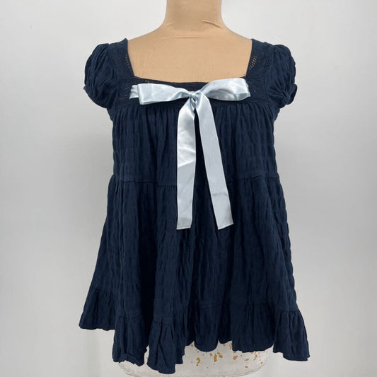 Kimichi Blue Sleeveless Shirt