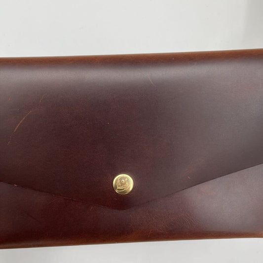 Howl + Hide Indy Clutch