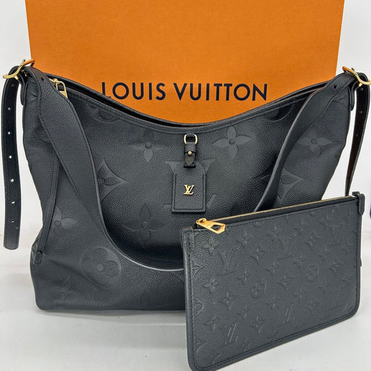 Louis Vuitton Carryall Handbag