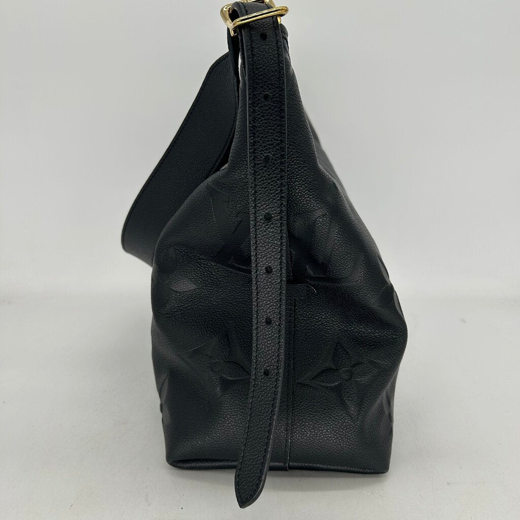 Louis Vuitton Carryall Handbag