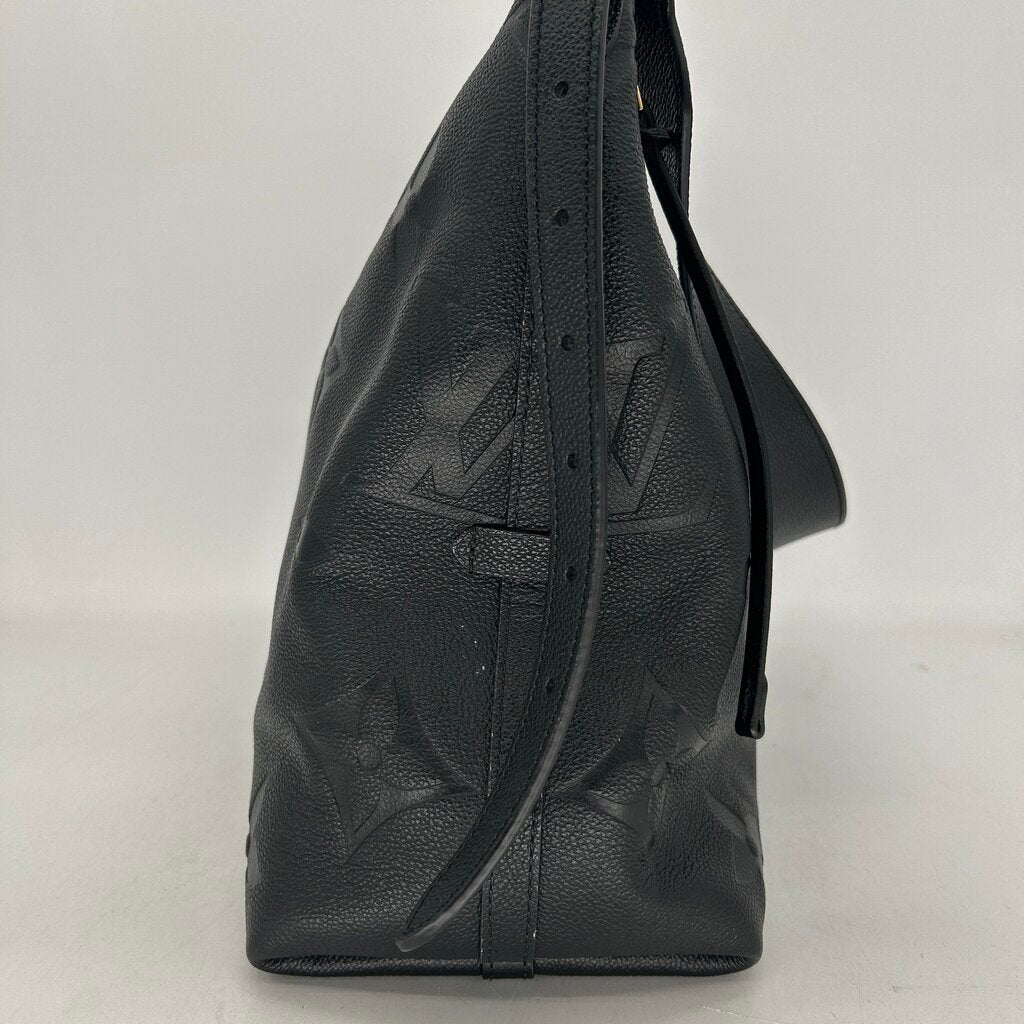 Louis Vuitton Carryall Handbag