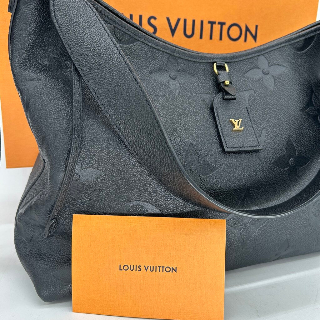 Louis Vuitton Carryall Handbag