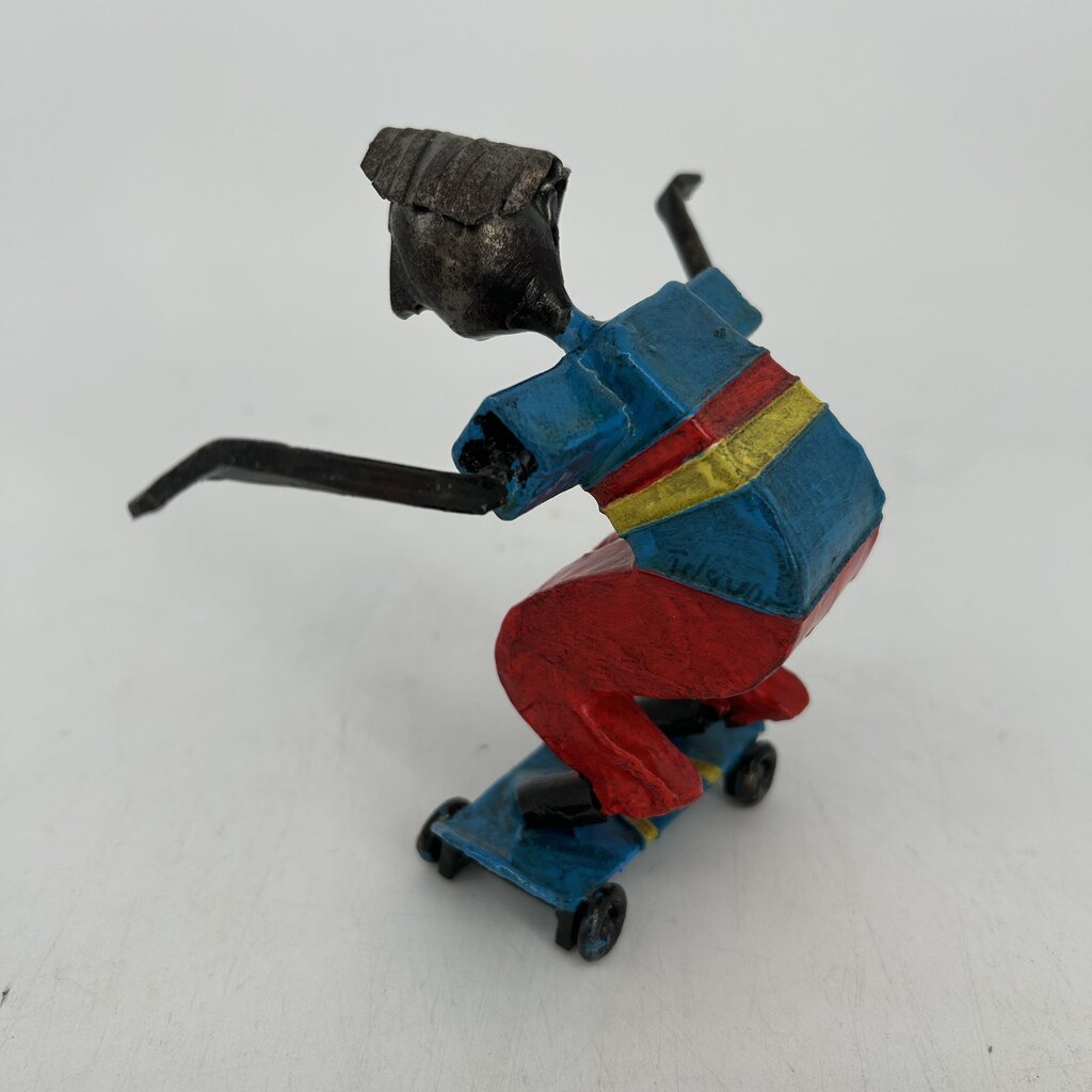 Boy on Skateboard Art Figurine