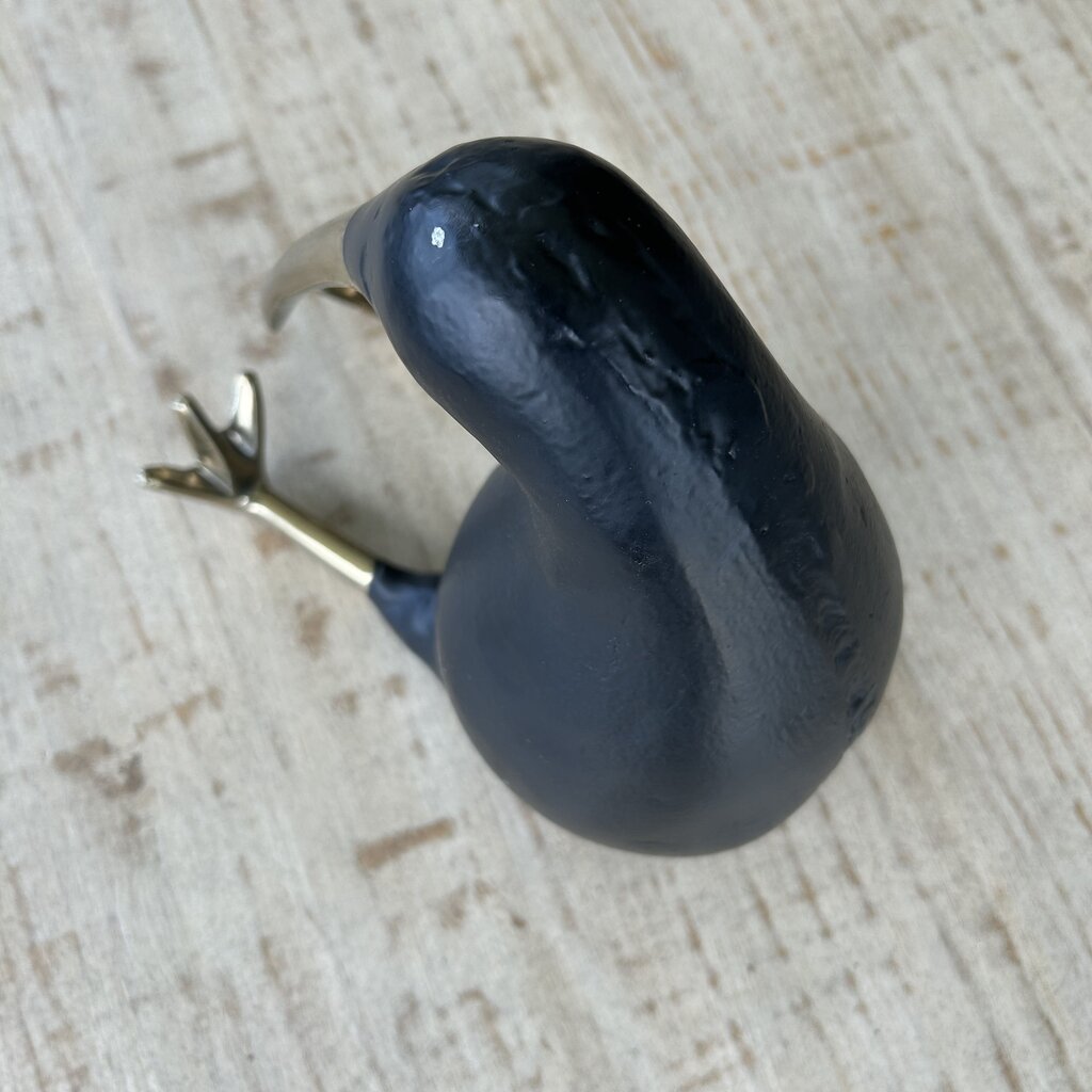 Sitting Penguin with Gold Beak