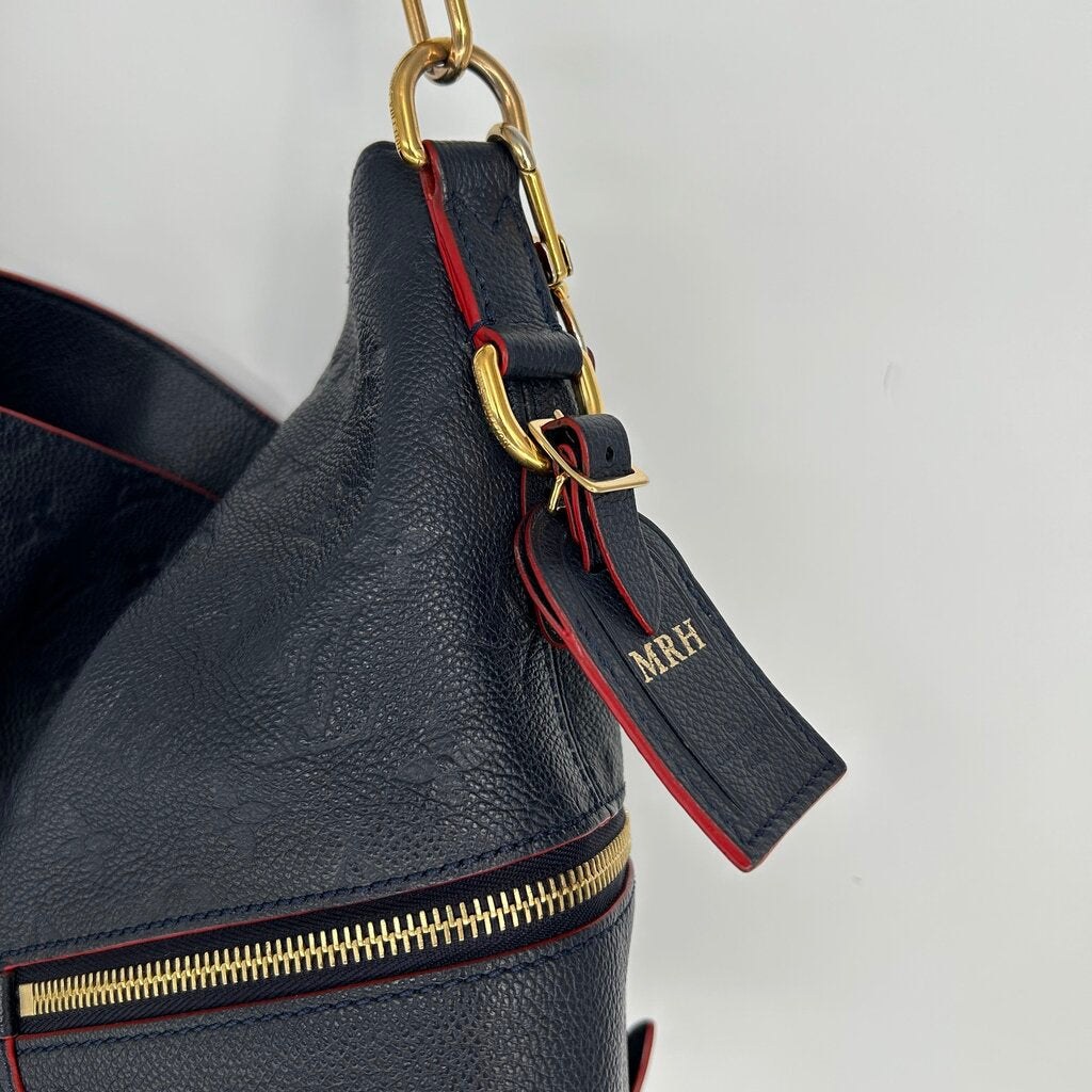 Louis Vuitton Melie Handbag