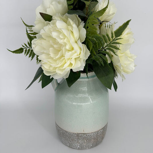 Faux Flowers in Jug