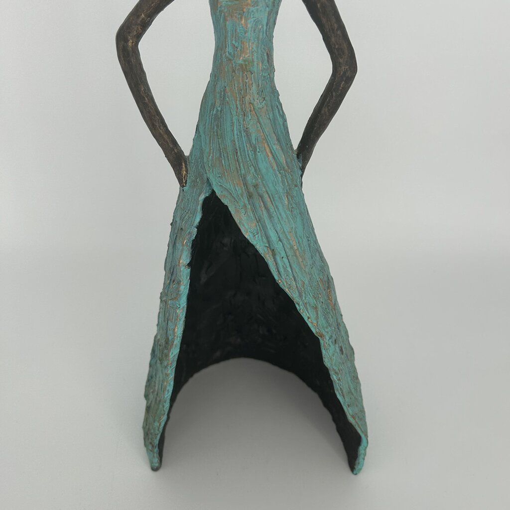 Female Sculpture in Flowing Dress