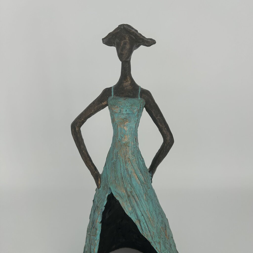 Female Sculpture in Flowing Dress