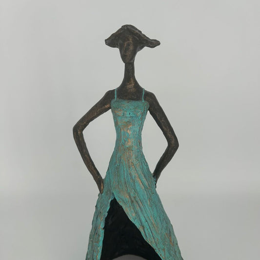 Female Sculpture in Flowing Dress